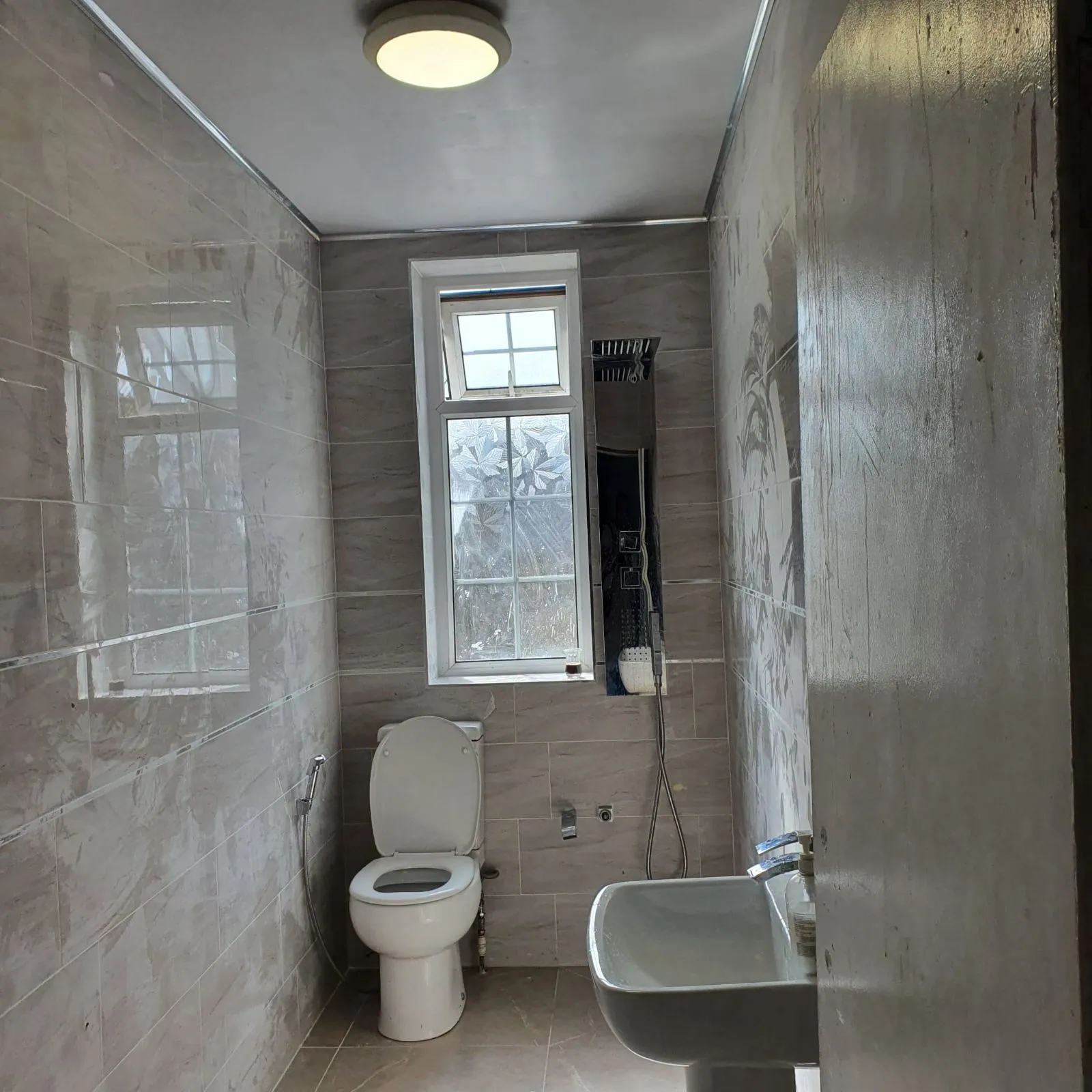 Finished bathroom with large-format tiles, Halifax