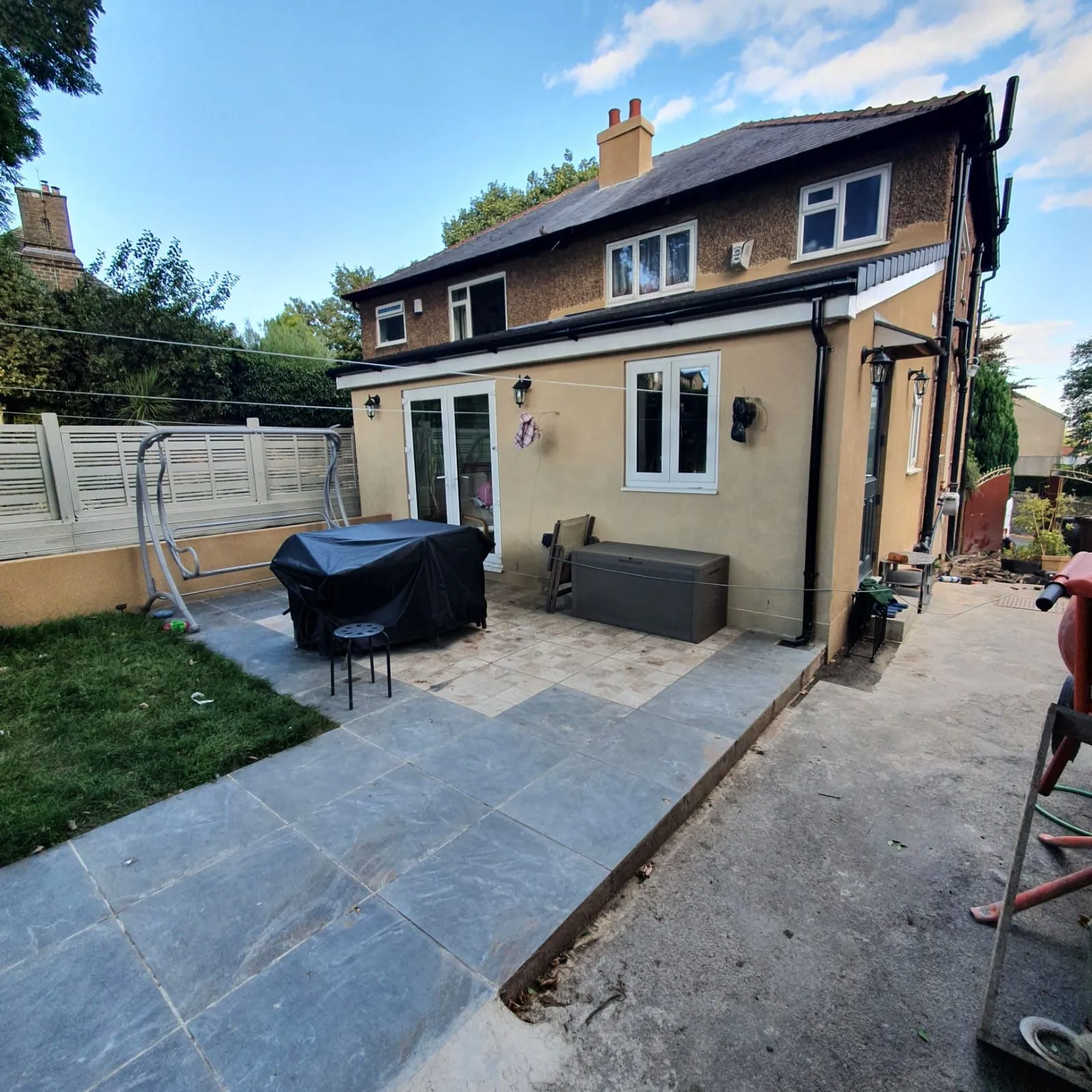 Finished single-storey rear extension with patio, Halifax