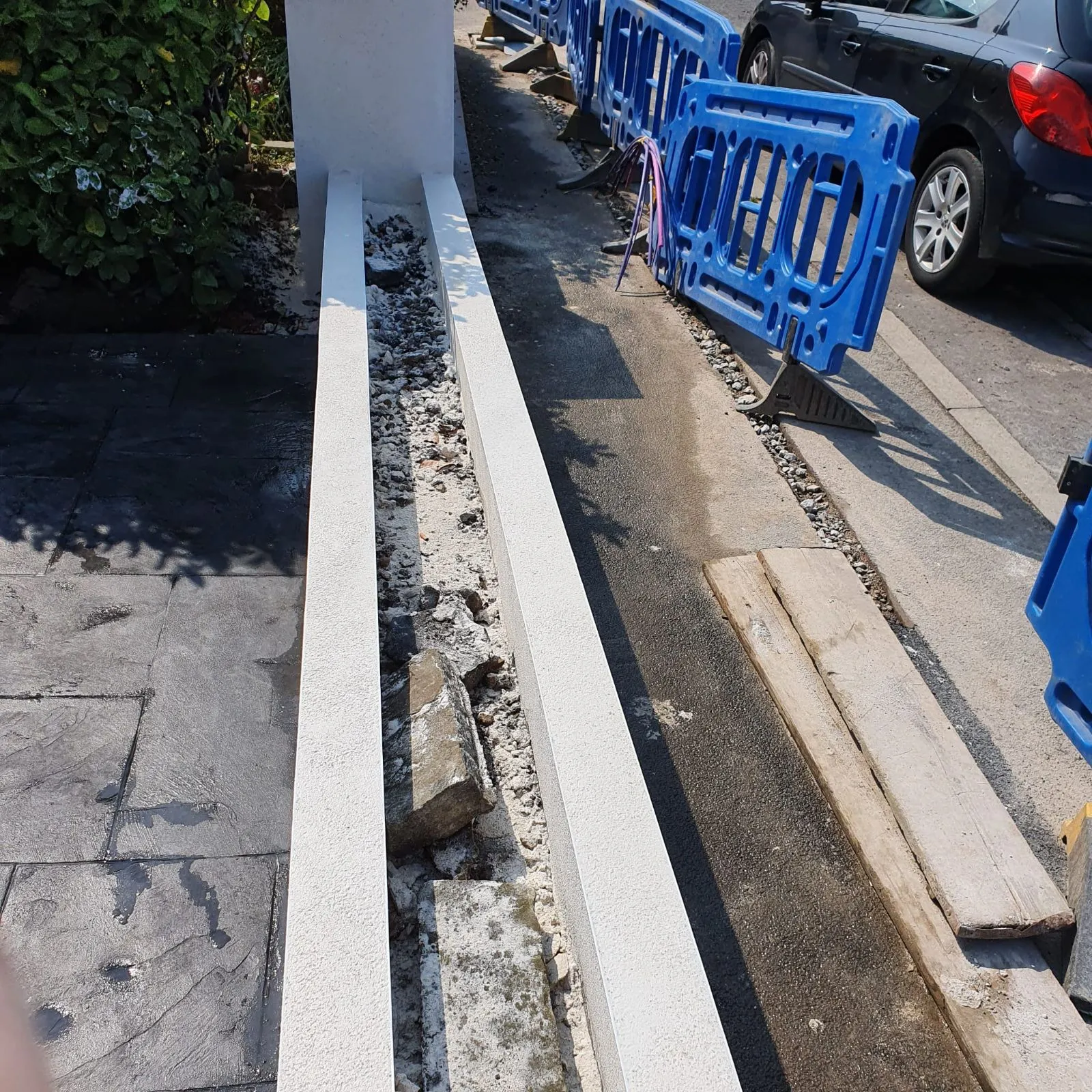 Garden wall with capping stones before rendering